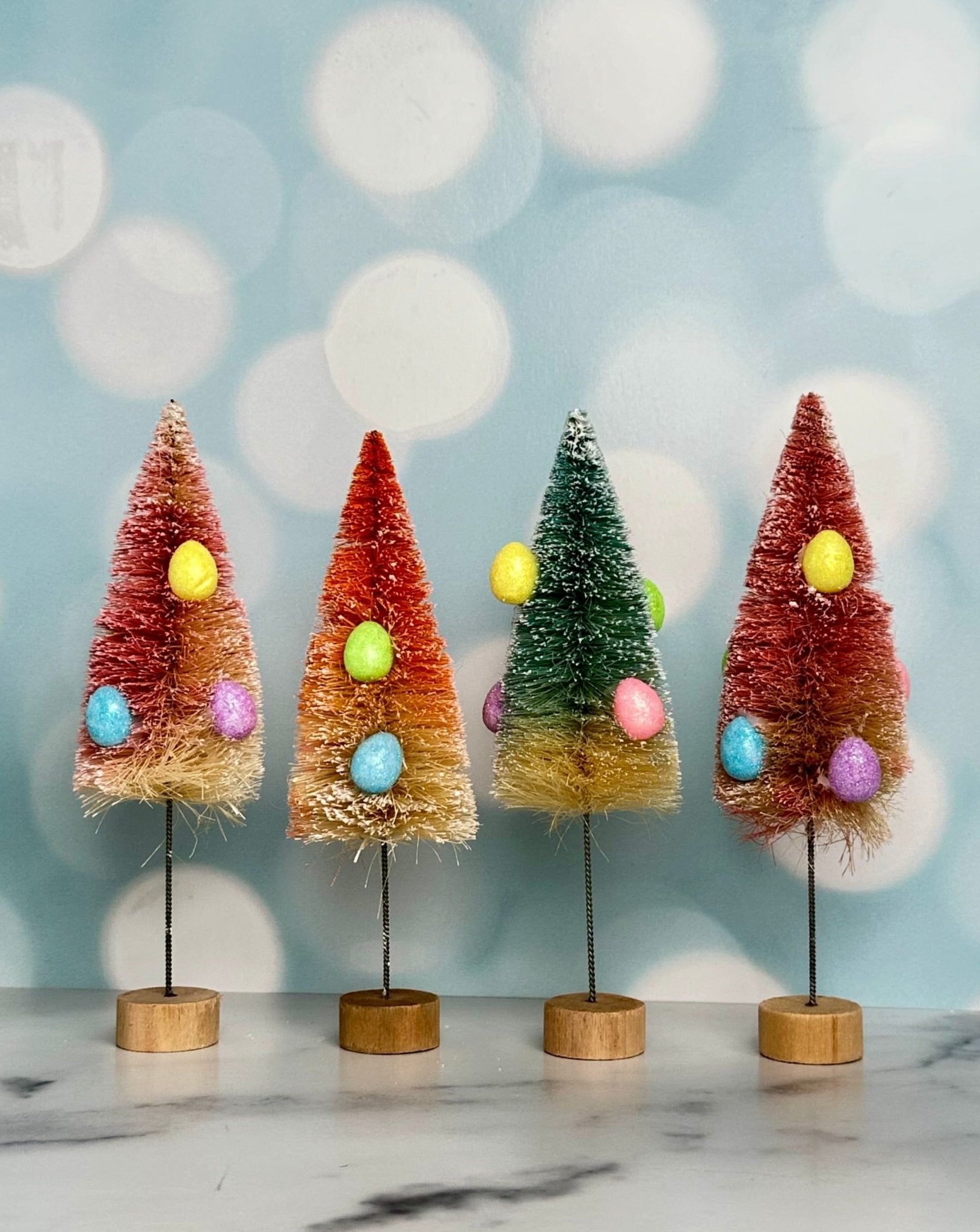 assorted bottle brush trees with easter egg decor - set of 4