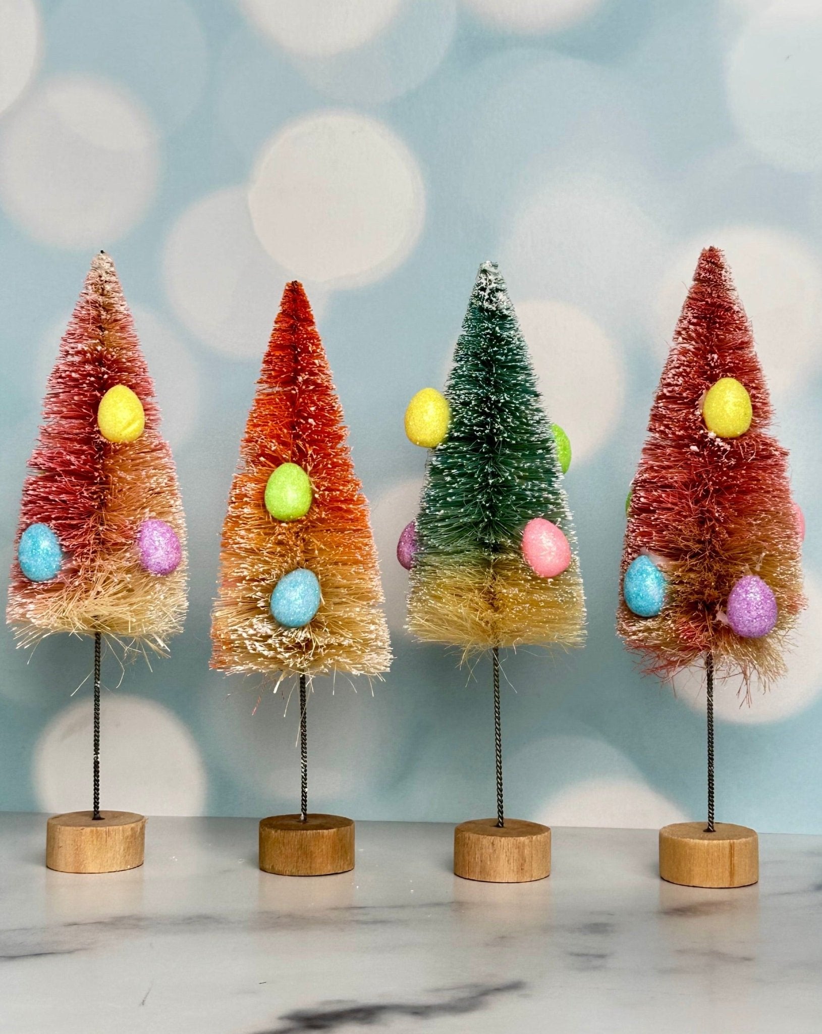 assorted bottle brush trees with easter egg decor - set of 4