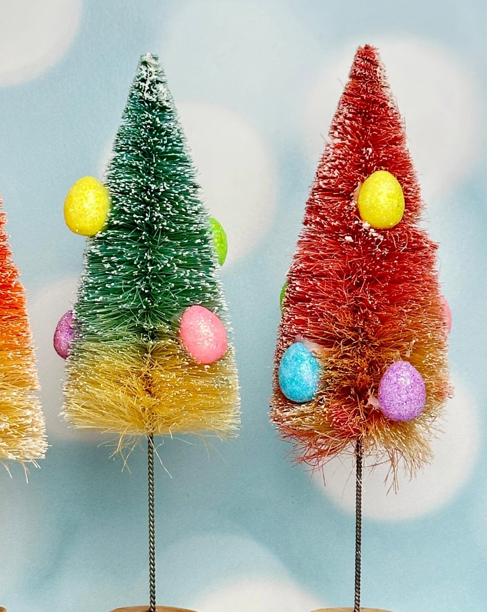 assorted bottle brush trees with easter egg decor - set of 4