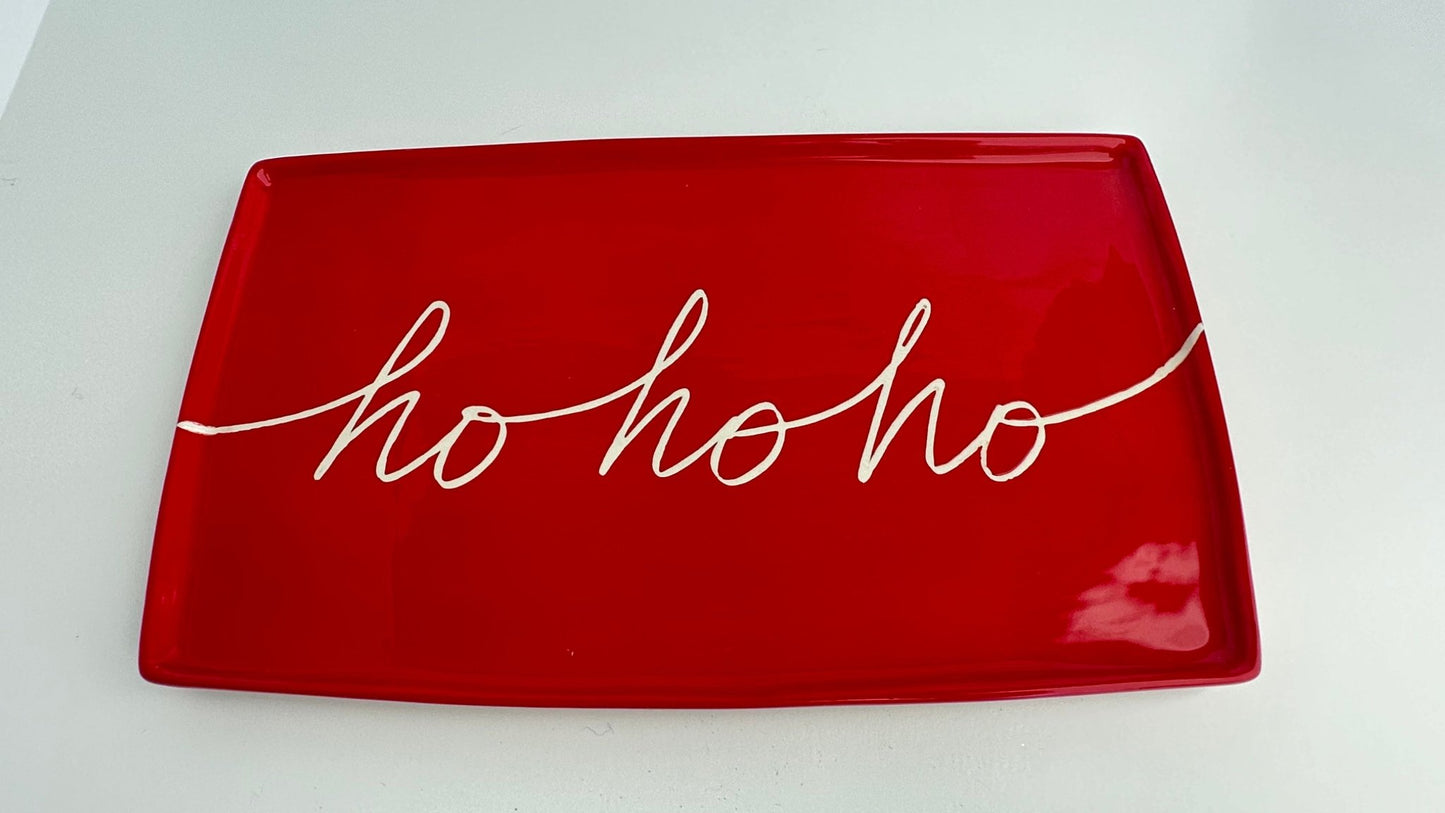 We put the HO in the HOLIDAYS! Start a Christmas tradition with our large ceramic platter that is perfect for Santa's Cookies our ceramic platter is approx. 13" x 7.75" x .5" 