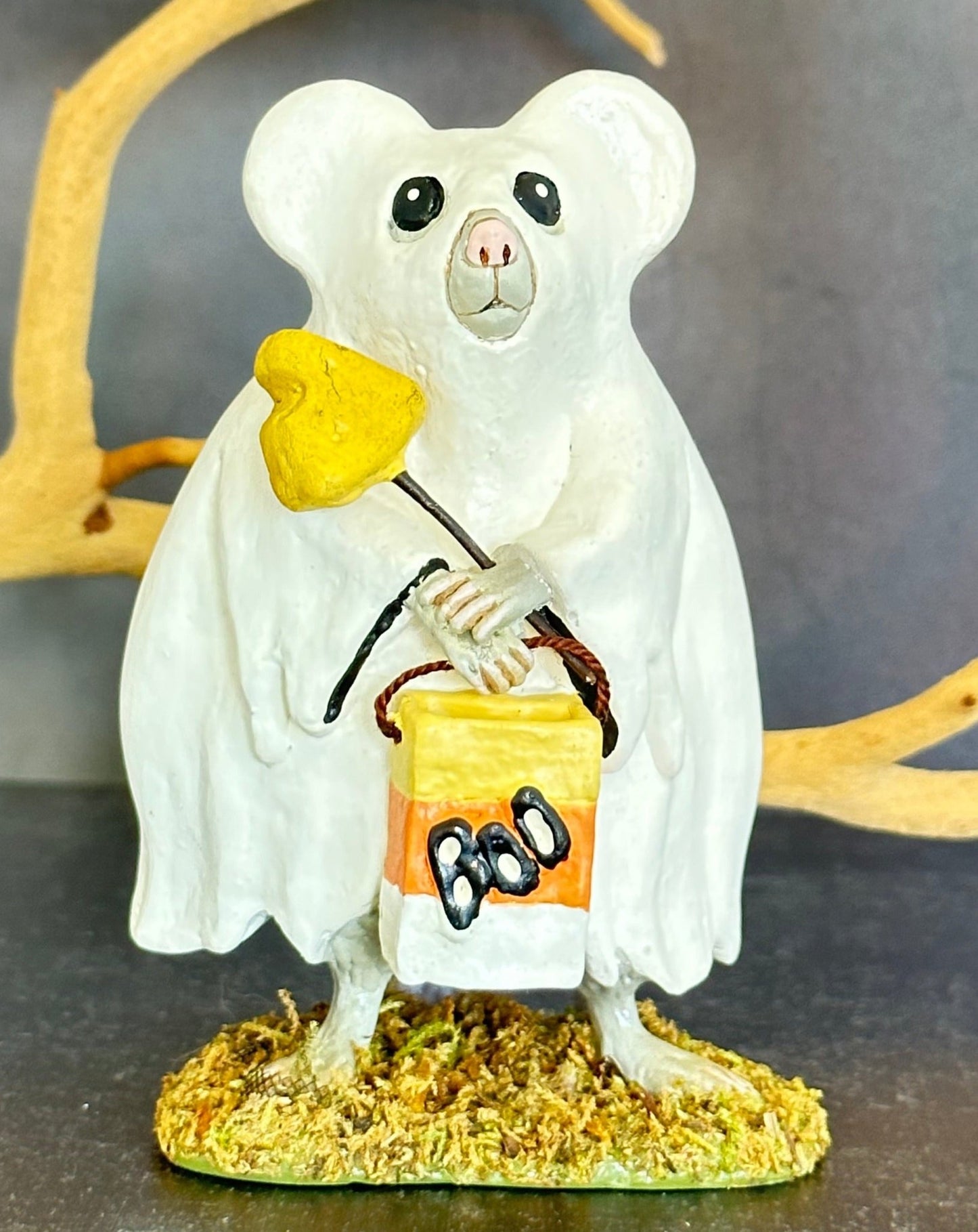 ghost mouse figurine who?