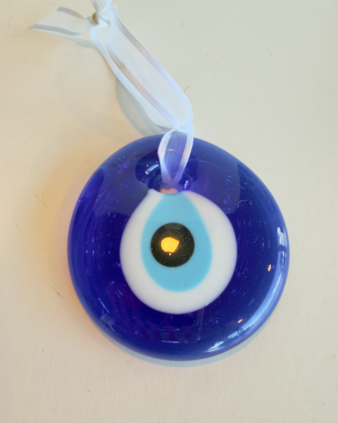 Evil Eye Glass Ornament - Approx. 2" handmade glass tied with a white ribbon.