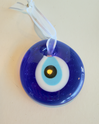 Evil Eye Glass Ornament - Approx. 2" handmade glass tied with a white ribbon.