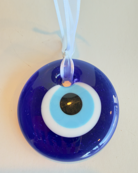 Evil Eye Glass Ornament - Approx. 2" handmade glass tied with a white ribbon.