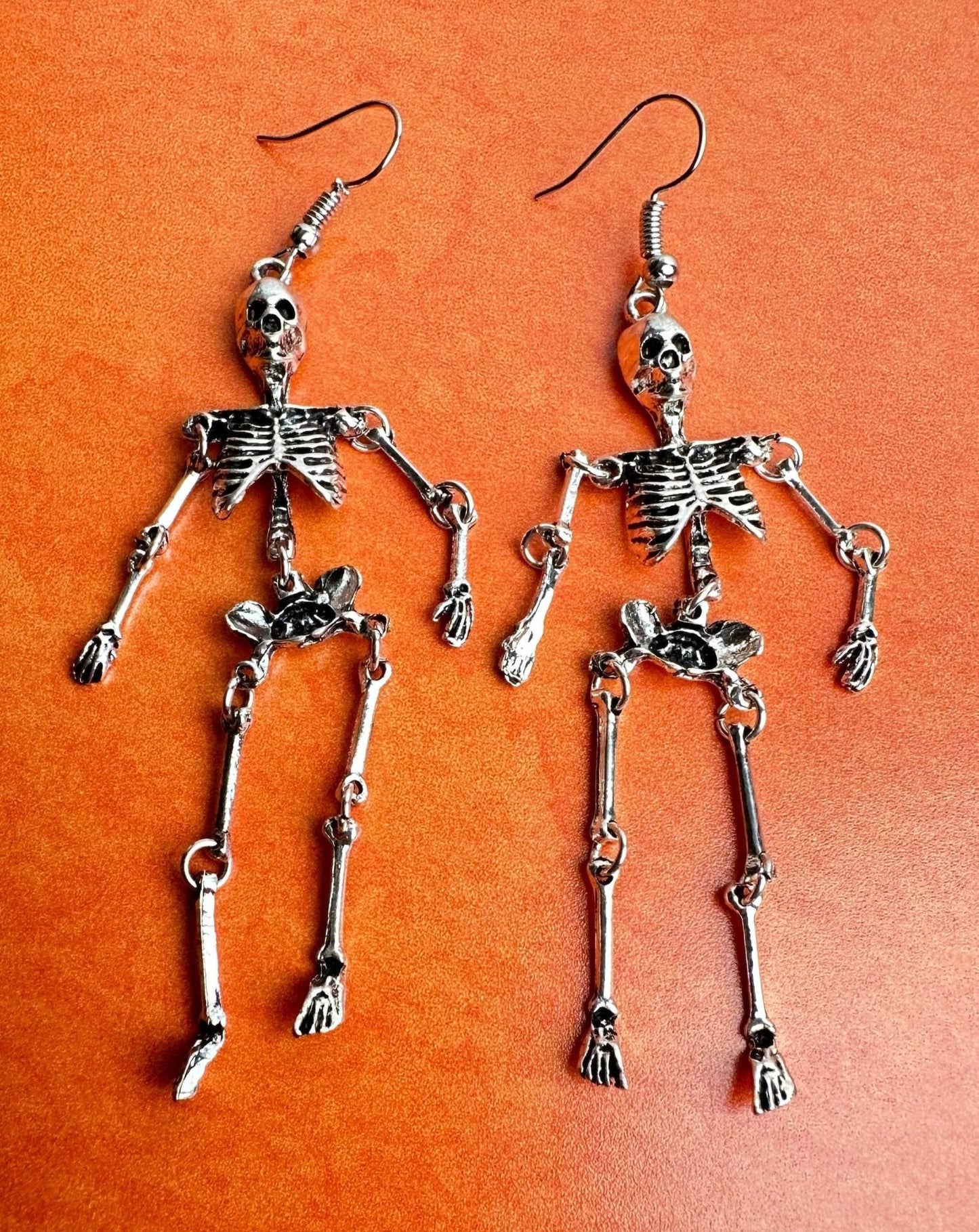 spooky skeleton earrings approx 3" set of two