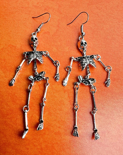 spooky skeleton earrings approx 3" set of two