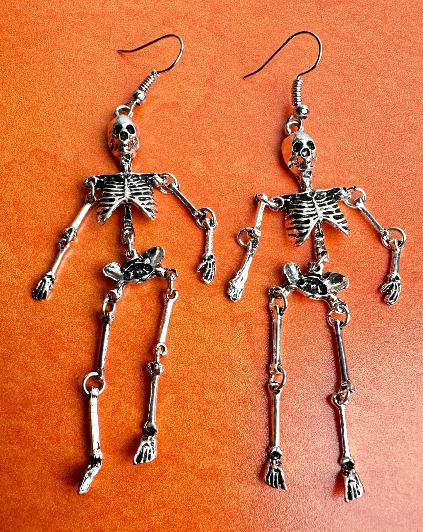 spooky skeleton earrings approx 3" set of two