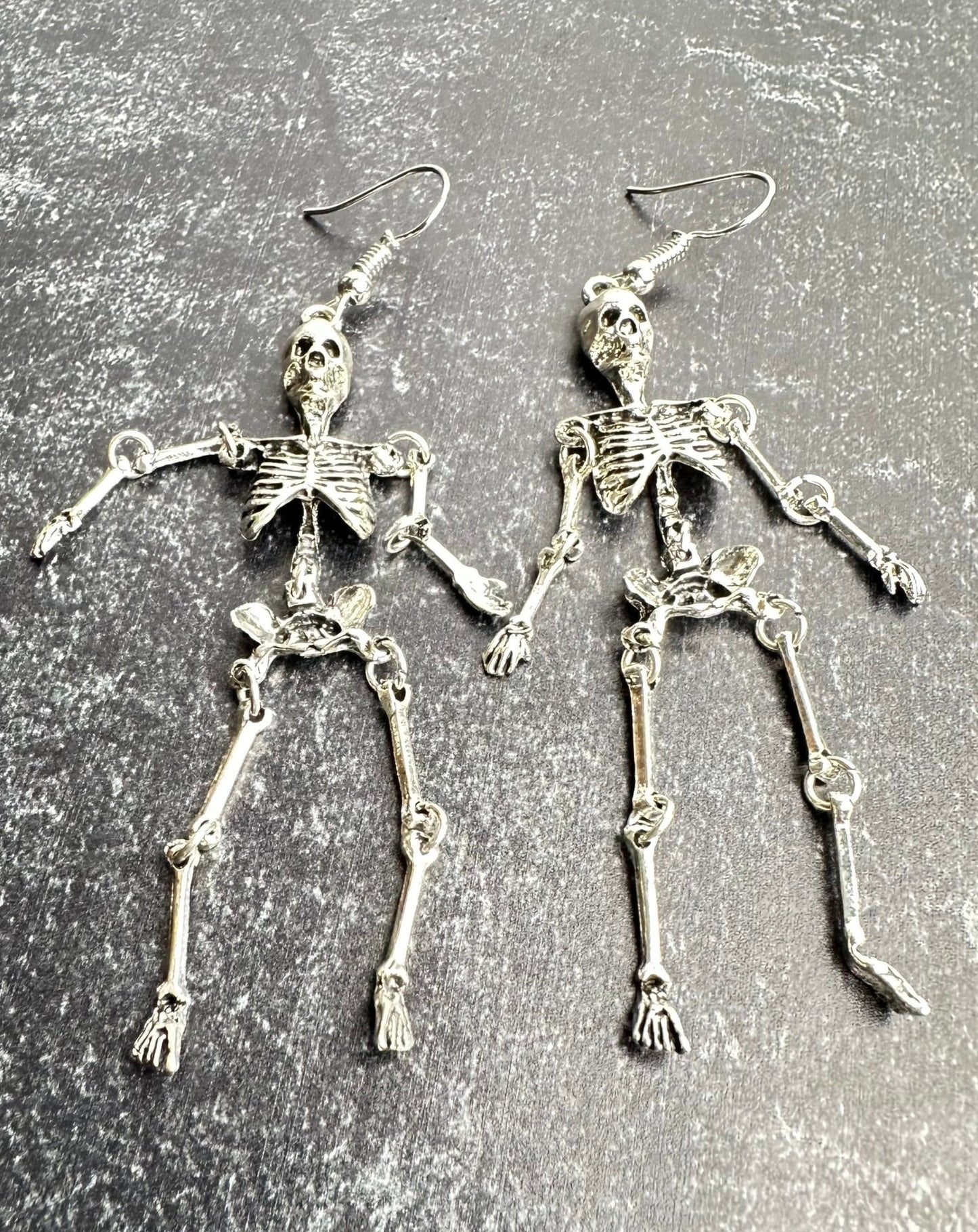 spooky skeleton earrings approx 3" set of two