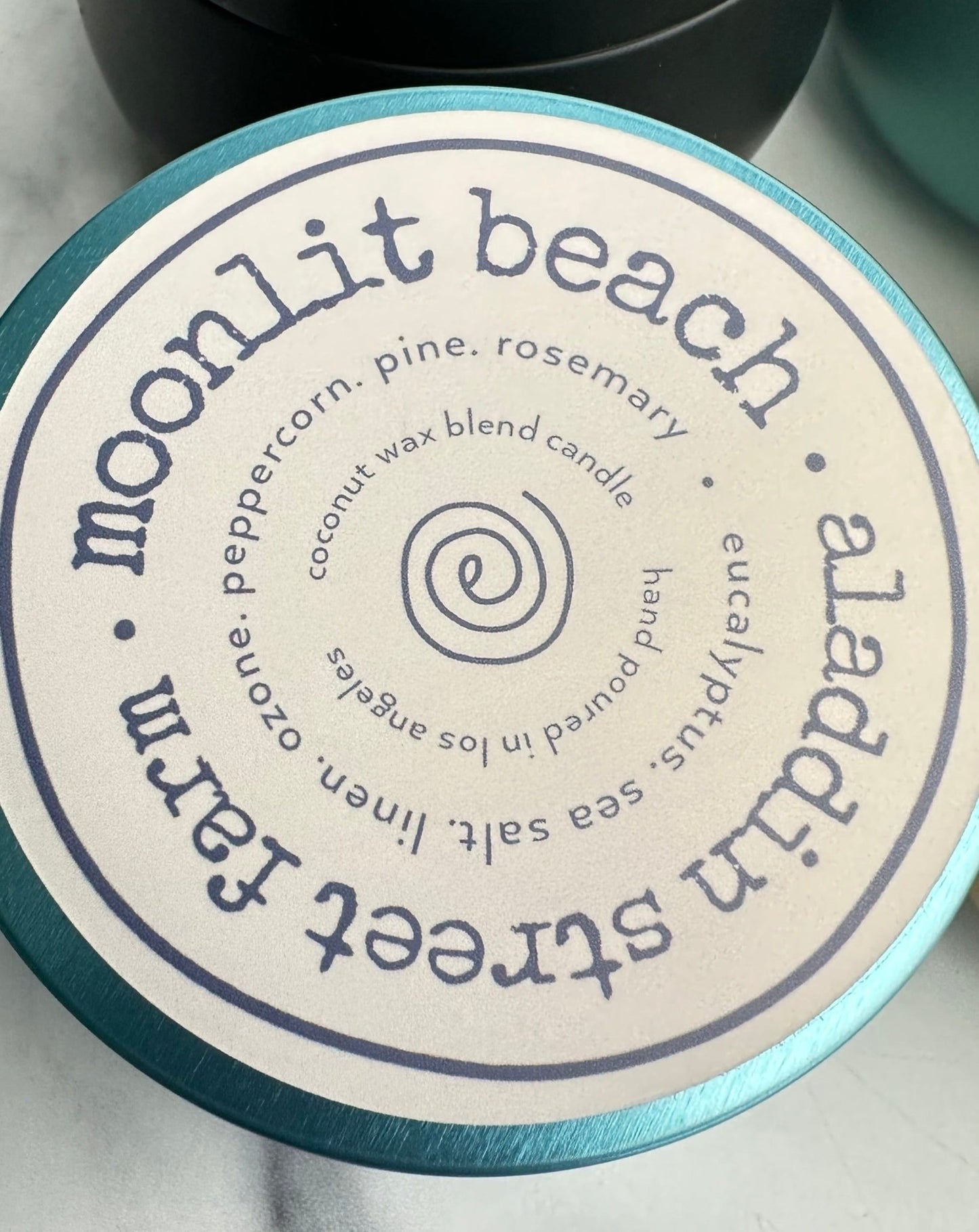 set of four 6oz signature fragrance collection tins - villains lair, morning hike, garden daze & moonlit beach