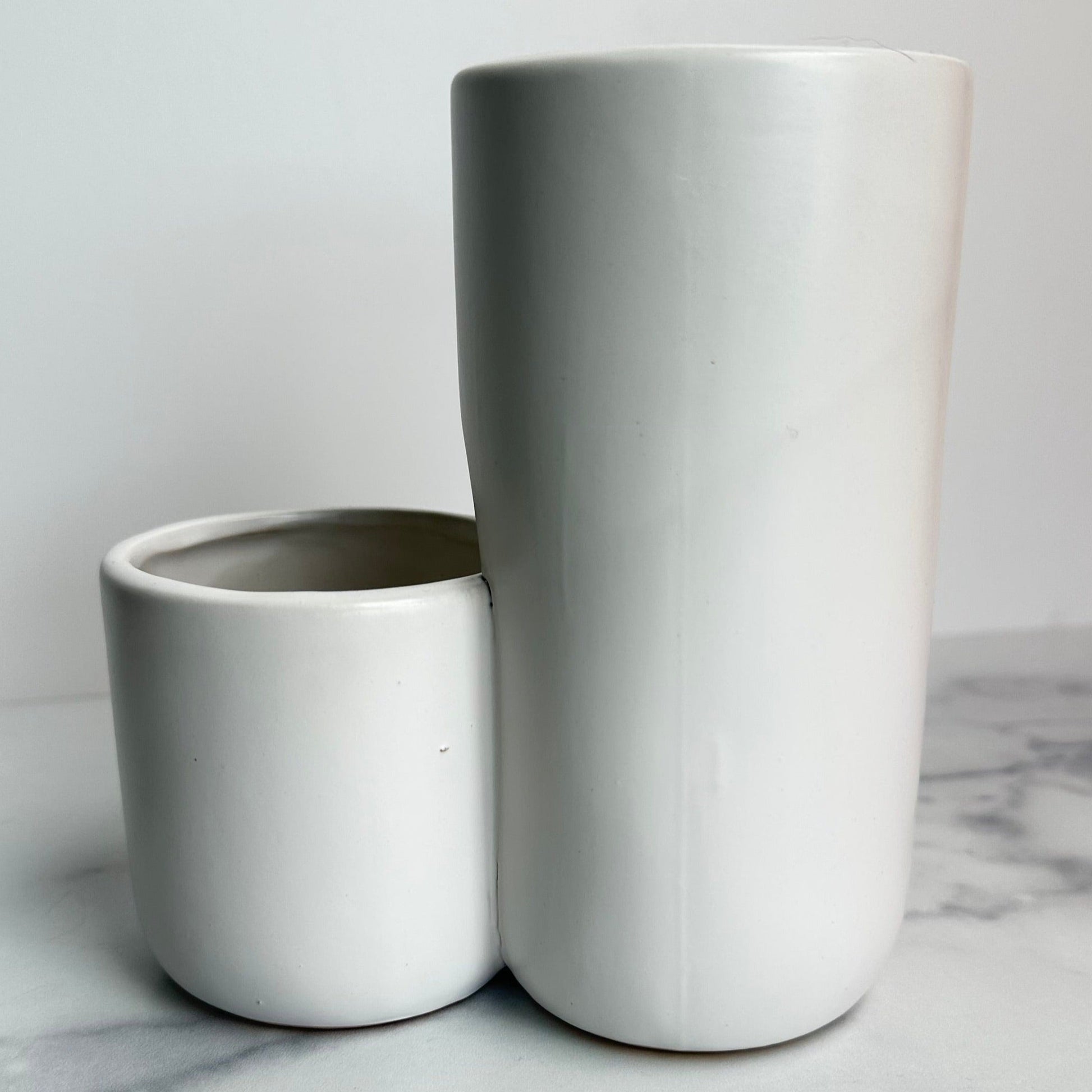 two tiered white ceramic vase