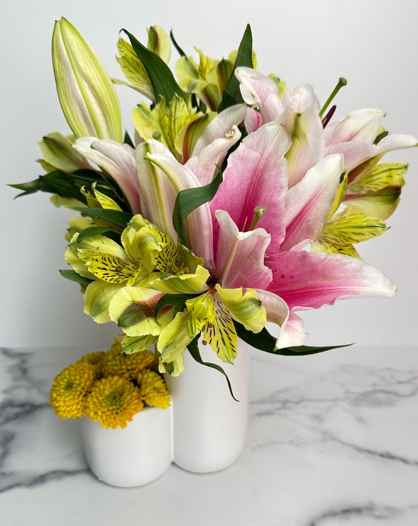 two tiered white ceramic vase