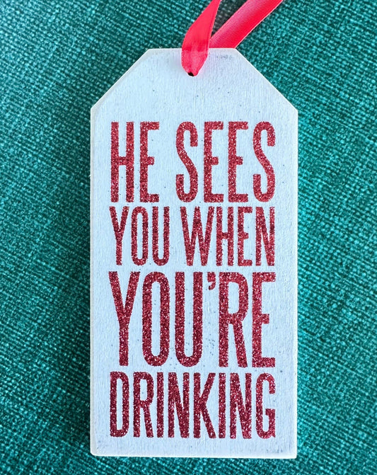 HE SEES YOU WHEN YOU'RE DRINKING - naughty christmas oversized gift tag ornament