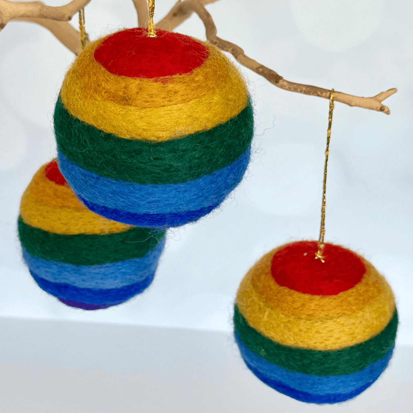 gay pride LGBTQ plus ornament in rainbow colors- approx. 3 inch handmade in Nepal by Women's Collectives