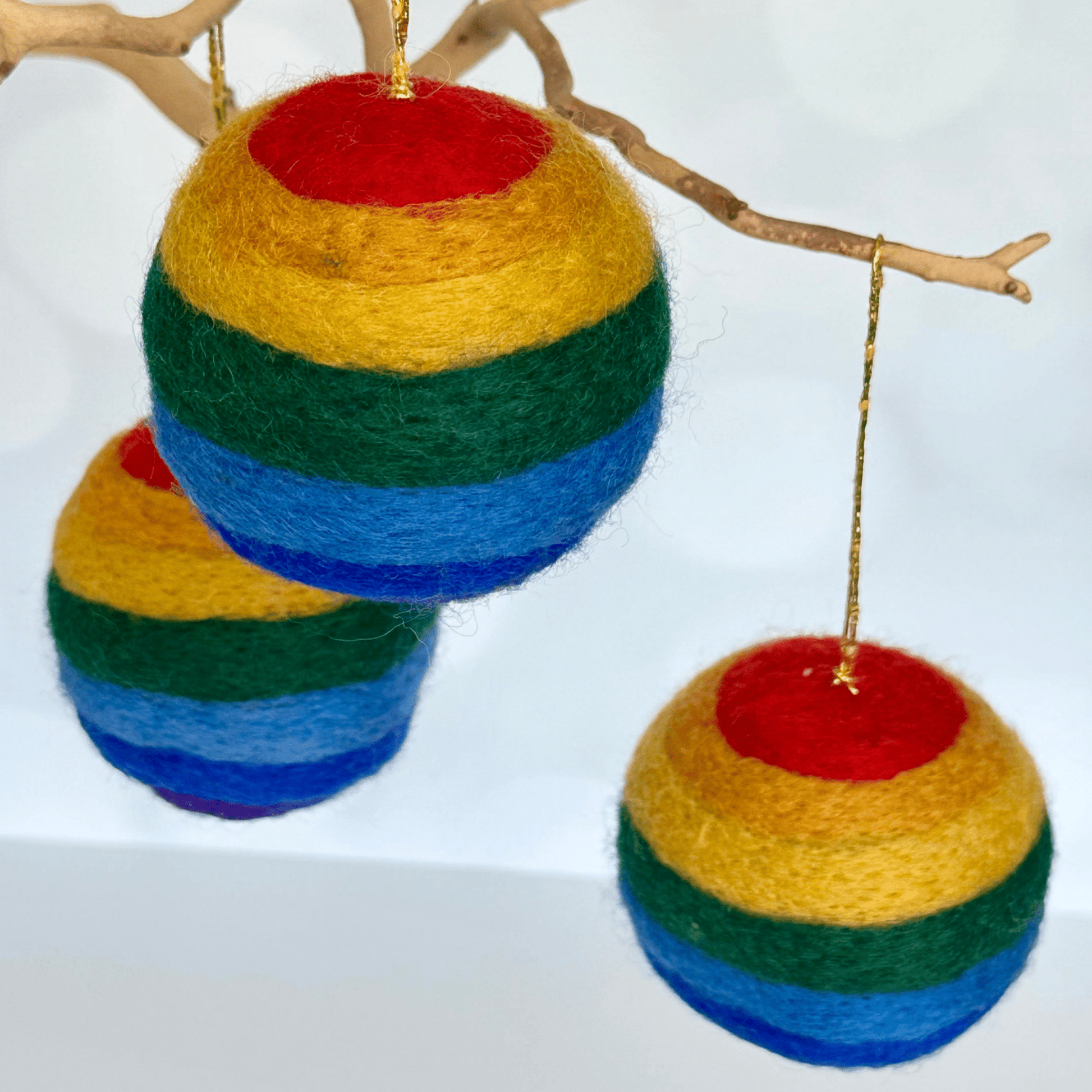 gay pride LGBTQ plus ornament in rainbow colors- approx. 3 inch handmade in Nepal by Women's Collectives