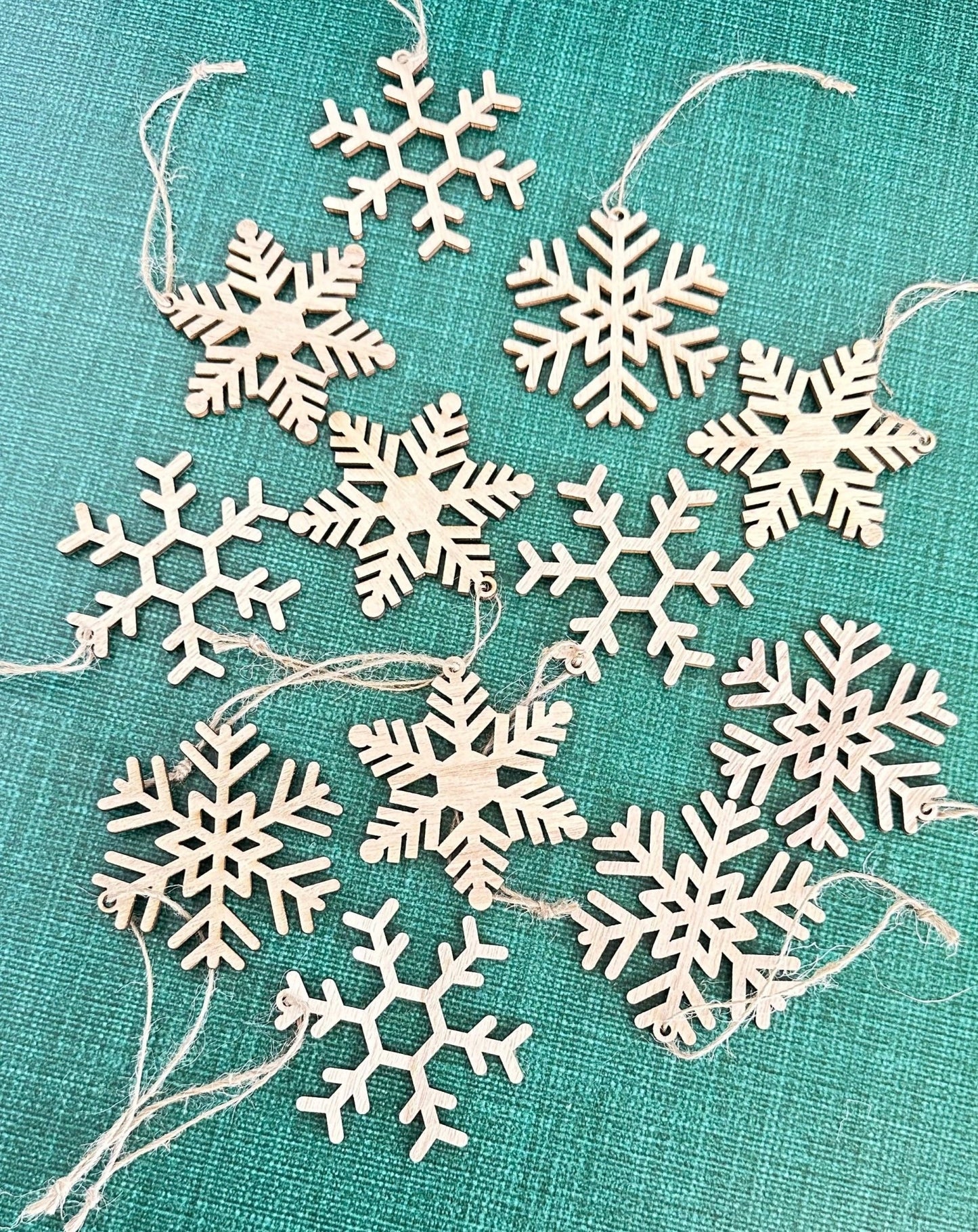 set of 12 wooden snowflake christmas ornaments