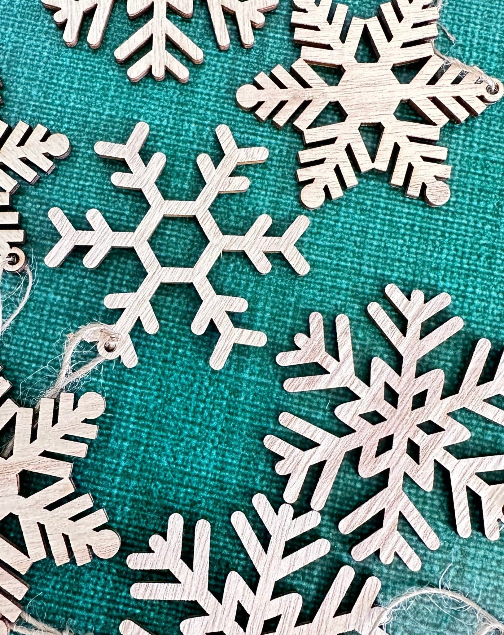 set of 12 wooden snowflake christmas ornaments