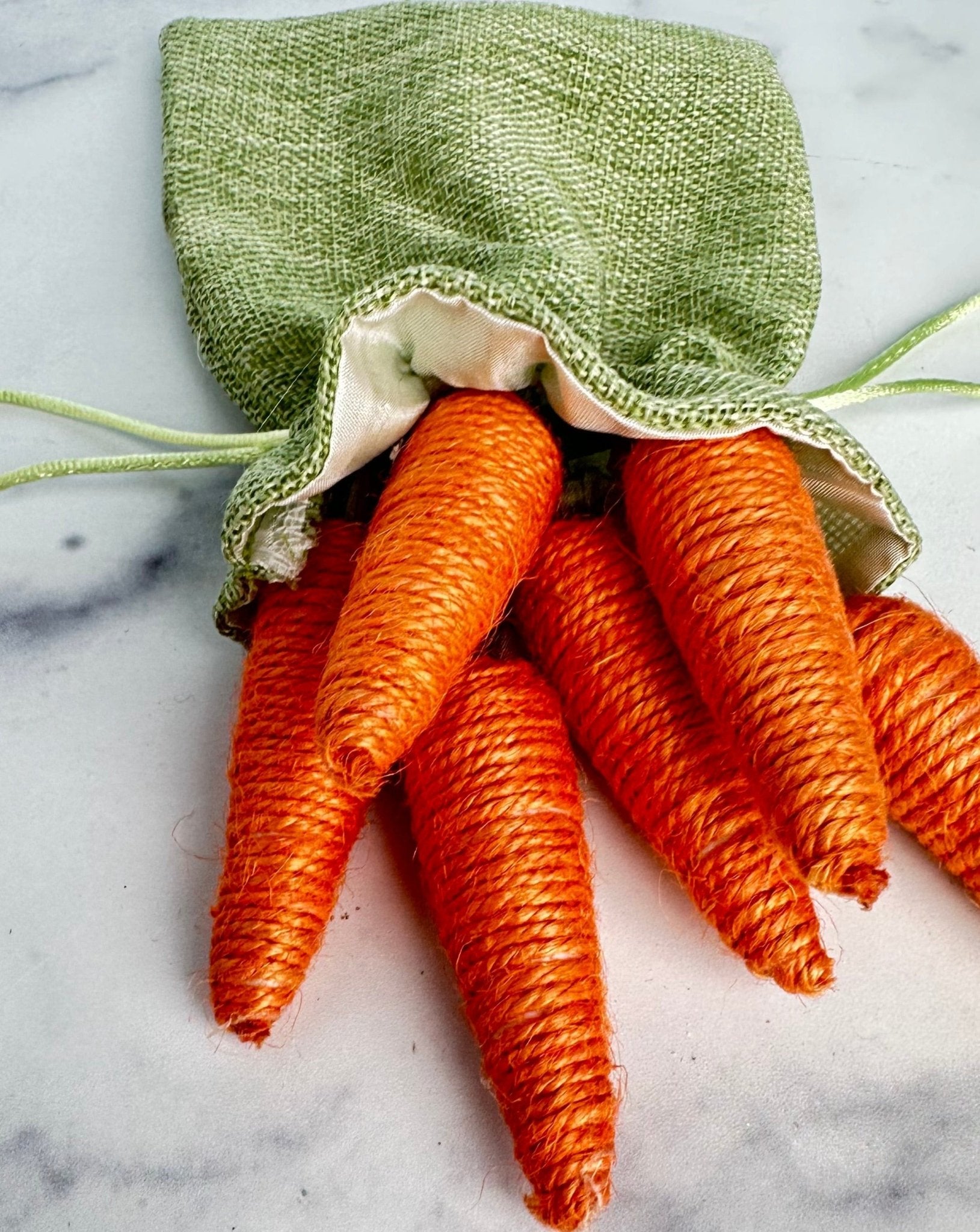 bag o' carrots in green burlap drawstring bag