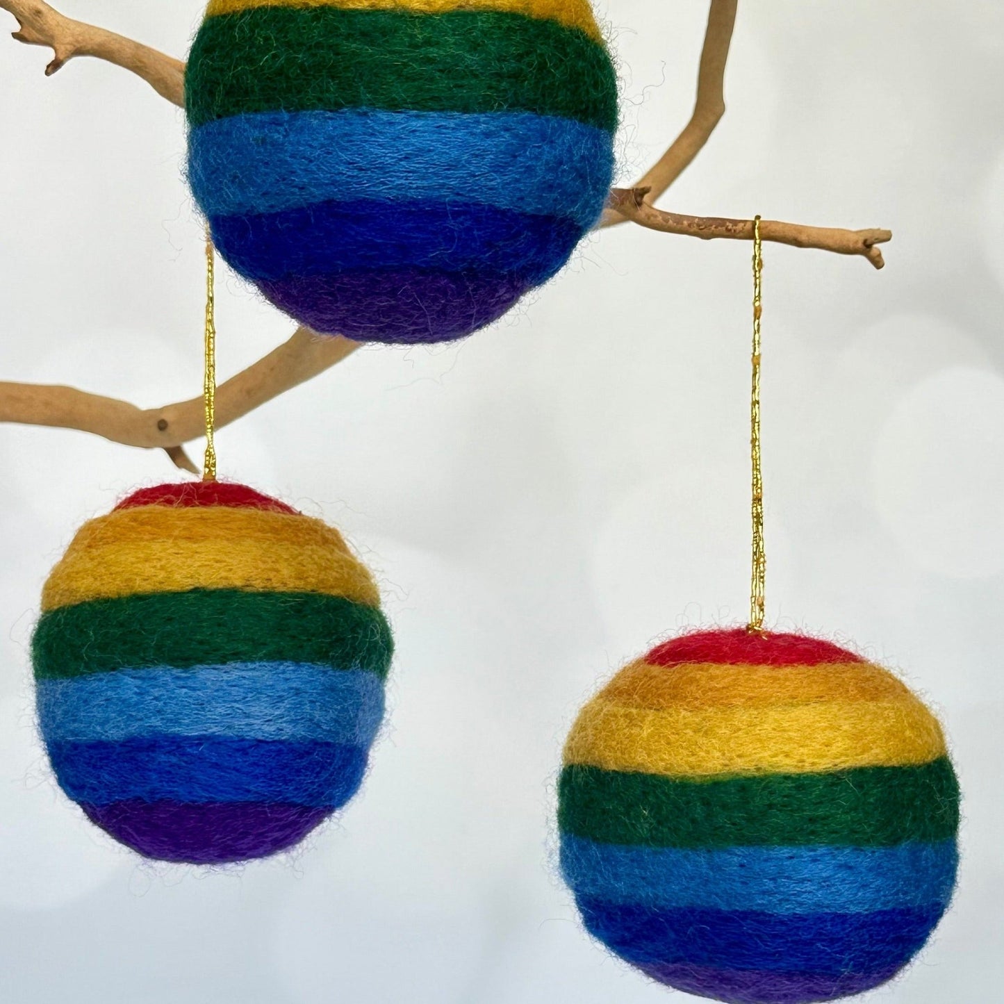 gay pride LGBTQ plus ornament in rainbow colors- approx. 3 inch handmade in Nepal by Women's Collectives