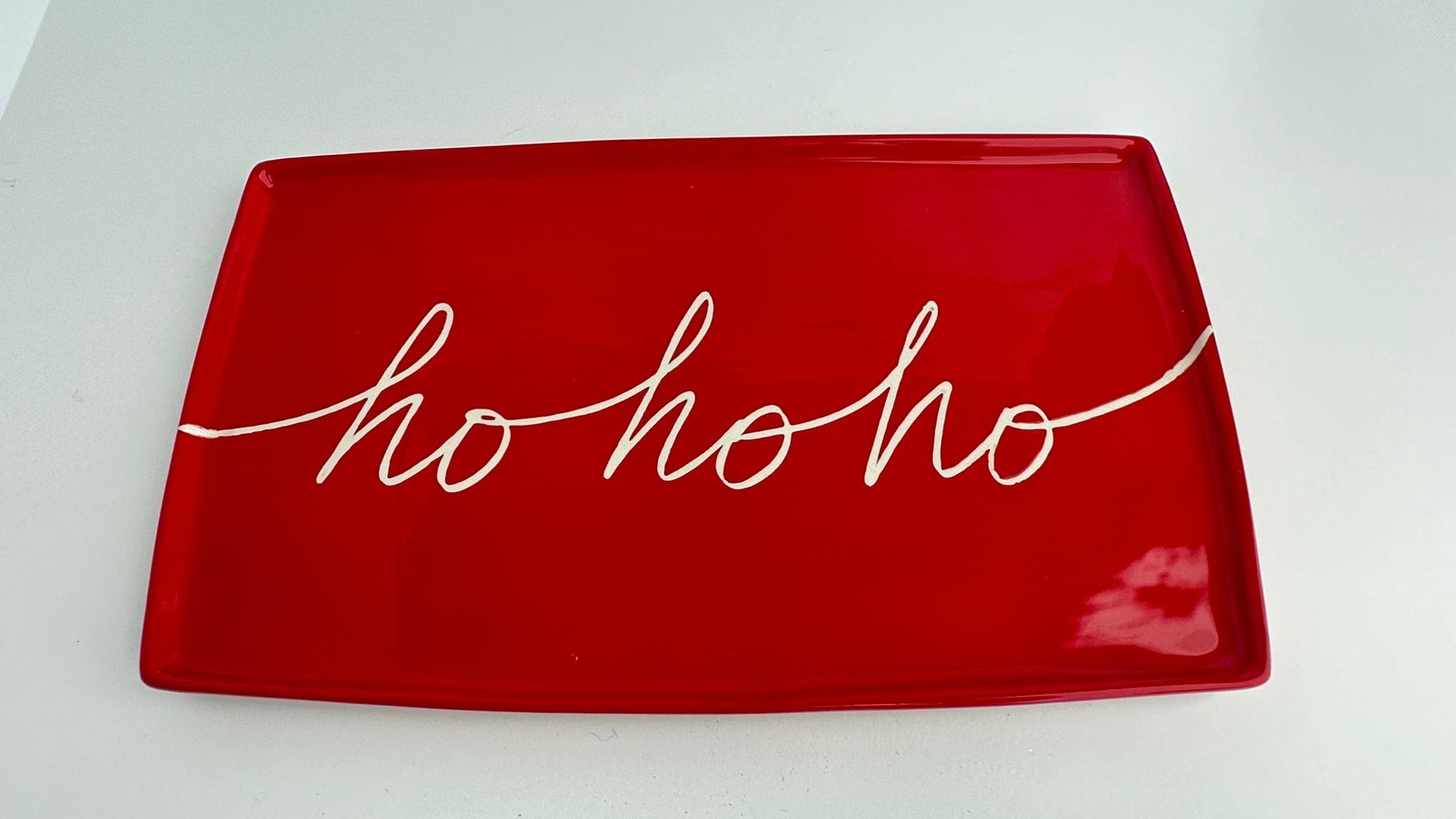 We put the HO in the HOLIDAYS!  Start a Christmas tradition with our large ceramic platter that is perfect for Santa's Cookies  our ceramic platter is approx. 13" x 7.75" x .5"&nbsp;