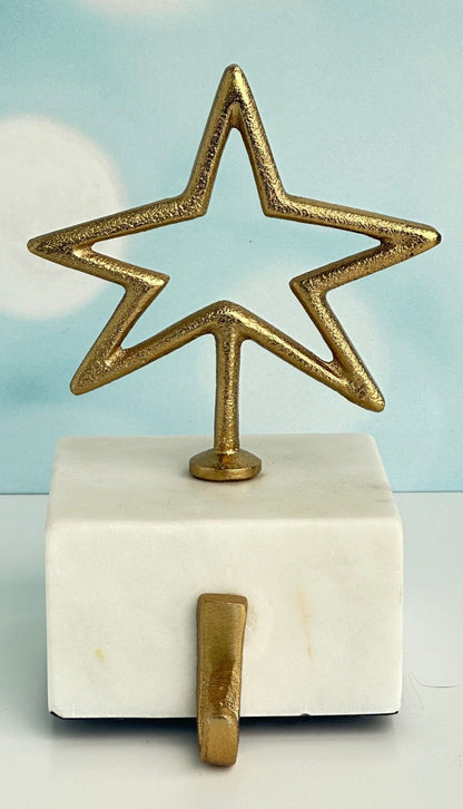 Peace & Star brass stocking holders with marble base