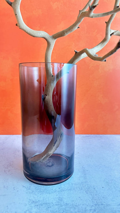 our beautiful smoked glass vase is perfect for Halloween&nbsp;  or any time of year  this large clear glass vase has an elegant grey smoked finish  size is approx. 10" tall by 5" wide