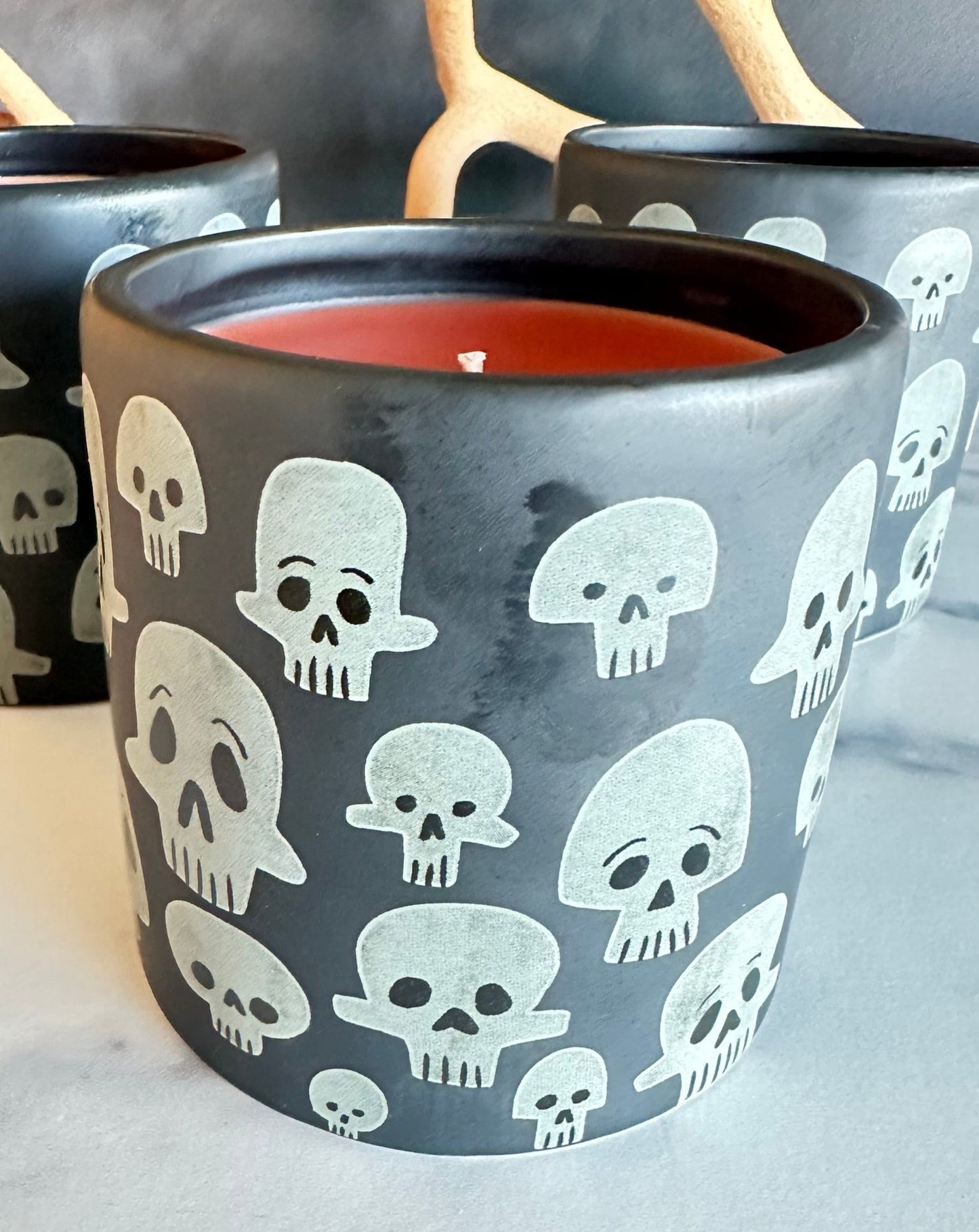 it smells like all the things you love about fall. especially starbucks pumpkin spice cold brew.  fragrance notes include:  pumpkin spice. fall leaves. the whisper in the fall wind.  our limited edition ceramic skull candle is a very generous 3.5 x 3.5 inch candle pot with custom blended scent and color.   quantities are extremely limited. so be sure to BOO now.   