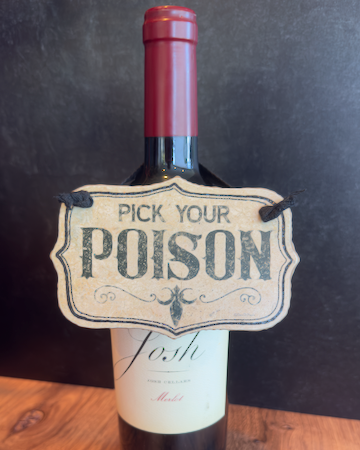 This set of two Halloween ornaments features two decorative hanging signs that reads 'PICK YOUR POISON' in distressed black lettering on an off-white background, suspended by a black ribbon.