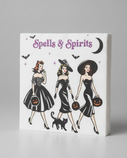 A set of 20 square paper napkin with a vintage-style witchy Halloween illustration reading 'Spells & Spirits,' featuring three women in black dresses, pumpkins, bats, and a black cat. Approx. 5" square.