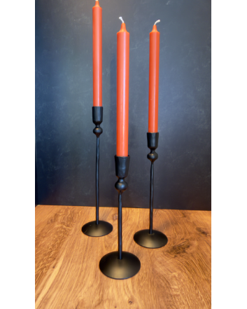 Our Witch's Coven Taper Holders. This set of 3 tall, slender black metal candle holders look like they are hand forged from steel. These spooky holders create a dramatic gothic display that feels right at home in a witch’s cottage, haunted manor, or Halloween tablescape.